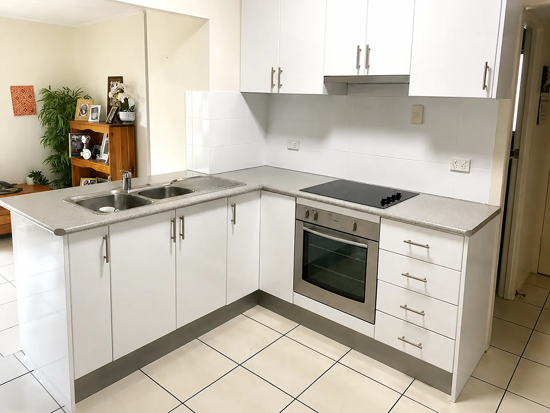 Finished light kitchen after benchtop and splashback resurfacing