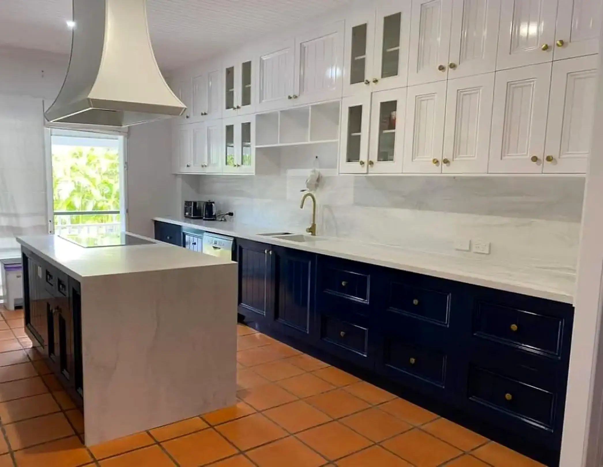 Finished navy and white kitchen resurfacing project